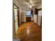 Efficient kitchen offers ample space for cooking and features classic appliances and wood cabinets at 1511 Walker Ave, College Park, GA 30337