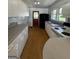 Functional kitchen with ample counter space and white cabinetry at 1511 Walker Ave, College Park, GA 30337