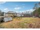 Large, fenced backyard with a gazebo, shed, and plenty of space for recreation and entertaining at 1406 Stone Ridge Ct, Hampton, GA 30228