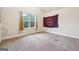 Bedroom with plush carpet and a window with natural light at 1406 Stone Ridge Ct, Hampton, GA 30228