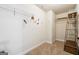 Walk-in closet with installed wire shelving and decorative wall decor at 1406 Stone Ridge Ct, Hampton, GA 30228