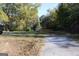 Partially cleared lot with a gravel driveway at 1372 Auburn Rd, Dacula, GA 30019