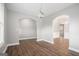 Elegant dining room featuring hardwood floors, arched doorways, and a modern light fixture at 1714 Boulder Walk Se Ln, Atlanta, GA 30316
