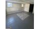 Unfinished basement with neutral colored tile floors at 11684 Heritage Dr, Hampton, GA 30228