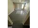 Bright basement with tile floors, a door, and windows at 11684 Heritage Dr, Hampton, GA 30228