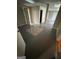 Large basement area with tile flooring and multiple rooms at 11684 Heritage Dr, Hampton, GA 30228