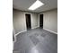 Spacious basement room with tile flooring and access to other rooms at 11684 Heritage Dr, Hampton, GA 30228