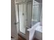 Bathroom with shower and laminate wood floor at 11684 Heritage Dr, Hampton, GA 30228