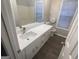 Clean bathroom featuring a shower/tub combo and updated vanity at 11684 Heritage Dr, Hampton, GA 30228