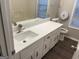 Renovated bathroom with a quartz countertop and updated sink at 11684 Heritage Dr, Hampton, GA 30228
