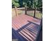 Wooden deck overlooks the backyard at 11684 Heritage Dr, Hampton, GA 30228