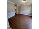 Open concept dining room with view into kitchen at 11684 Heritage Dr, Hampton, GA 30228