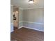 Simple dining room with laminate flooring and neutral walls at 11684 Heritage Dr, Hampton, GA 30228