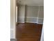 Formal dining room with neutral walls and laminate flooring at 11684 Heritage Dr, Hampton, GA 30228