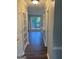 Bright entryway with view into living room and kitchen at 11684 Heritage Dr, Hampton, GA 30228