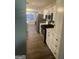 Modern kitchen features stainless steel appliances and white cabinets at 11684 Heritage Dr, Hampton, GA 30228