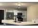 Eat-in kitchen boasting stainless steel appliances and an island at 11684 Heritage Dr, Hampton, GA 30228
