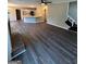 Large living room with fireplace and hardwood floors at 11684 Heritage Dr, Hampton, GA 30228