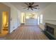 Spacious living room with fireplace, view of kitchen, and lots of natural light at 4284 Caroline Ct, Douglasville, GA 30135