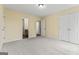 Comfortable bedroom with double doors and access to an ensuite bathroom for convenience at 167 London Dr, Mcdonough, GA 30253