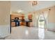 Bright kitchen featuring classic cabinetry, modern appliances, and a sliding door to the outdoors at 1963 Lakeshore Overlook Nw Cir, Kennesaw, GA 30152