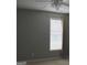 Bright bedroom with ceiling fan and window coverings at 175 Camry Ln, Grayson, GA 30017