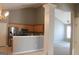 Open concept kitchen and dining area with breakfast bar at 175 Camry Ln, Grayson, GA 30017