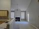 Open floorplan with kitchen island overlooking living room at 175 Camry Ln, Grayson, GA 30017