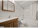 Bathroom featuring a wood vanity and tiled floors at 85 Bloomfield Way, Sharpsburg, GA 30277