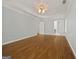 Large bedroom features tray ceilings, recessed lights and hardwood floors at 85 Bloomfield Way, Sharpsburg, GA 30277