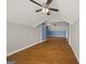 Bonus room with hardwood floors, natural light, and a ceiling fan offering a flexible space for various uses at 85 Bloomfield Way, Sharpsburg, GA 30277