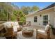 Inviting deck with comfortable seating, perfect for relaxing and enjoying the outdoors at 85 Bloomfield Way, Sharpsburg, GA 30277