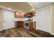 Kitchen featuring stainless steel appliances and hardwood floors at 85 Bloomfield Way, Sharpsburg, GA 30277