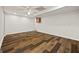 A clean room with hardwood floors and white walls at 85 Bloomfield Way, Sharpsburg, GA 30277