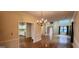 Bright dining room with hardwood floors and chandelier at 621 Granby Hill Pl, Alpharetta, GA 30022