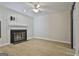 Living room with fireplace and barn door at 33 Cobblestone Crk, Peachtree City, GA 30269