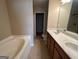 Double vanity bathroom with soaking tub and separate shower at 2809 Hillside Way, Decatur, GA 30034