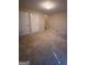 Large carpeted bedroom with two doors and access to upper level at 2809 Hillside Way, Decatur, GA 30034