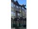 Three-story townhouses with brick and siding exteriors at 2809 Hillside Way, Decatur, GA 30034