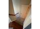 Upstairs hallway with carpeted stairs at 2809 Hillside Way, Decatur, GA 30034