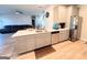 Open kitchen features modern cabinetry, stainless steel appliances, and a convenient island at 116 Jodi Pl, Locust Grove, GA 30248