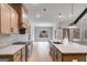 Modern kitchen featuring stainless steel appliances, tile backsplash, and an open floor plan at 426 Ayers Rd, Bowdon, GA 30108