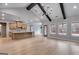 Open-concept living room and kitchen showcasing a large center island and vaulted ceilings at 426 Ayers Rd, Bowdon, GA 30108