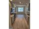 Bright kitchen featuring stainless appliances, gray cabinets, and a large dining area at 1601 Celestial Ct, Mcdonough, GA 30253