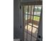 Door to sunroom featuring glass windows with a view to the patio at 1601 Celestial Ct, Mcdonough, GA 30253