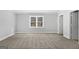 Bright bedroom with neutral paint and carpet. Natural light from window at 849 Wagon Wheel Cir, Fayetteville, GA 30214