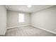 Neutral bedroom with carpet and natural light from one window at 849 Wagon Wheel Cir, Fayetteville, GA 30214