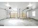 Spacious two-car garage with white walls and doors, ready for customization at 849 Wagon Wheel Cir, Fayetteville, GA 30214