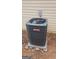 Goodman AC unit sitting on a concrete slab outside the home at 475 Lakeside Cir, Covington, GA 30016