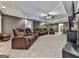 Basement Living Room with reclining sofas, carpeted floors, and a ceiling fan at 1009 Fairway Seven, Villa Rica, GA 30180